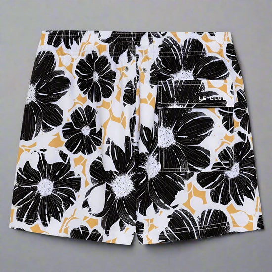 Le Club Apparel & Accessories > Clothing > Shorts White & Black Bloom Floral Print Men's Swim Trunk Board Shorts 2024 White w/ Black Flower Men's Swim Trunk Board Shorts