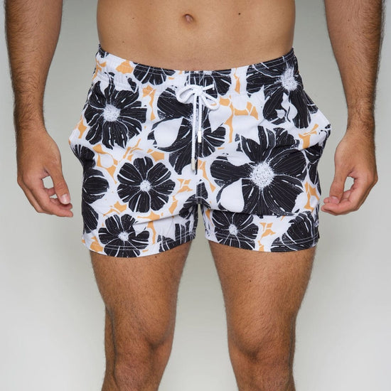 Le Club Apparel & Accessories > Clothing > Shorts White & Black Bloom Floral Print Men's Swim Trunk Board Shorts 2024 White w/ Black Flower Men's Swim Trunk Board Shorts