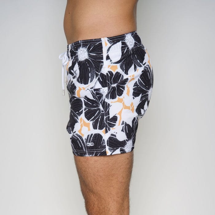 Le Club Apparel & Accessories > Clothing > Shorts White & Black Bloom Floral Print Men's Swim Trunk Board Shorts 2024 White w/ Black Flower Men's Swim Trunk Board Shorts